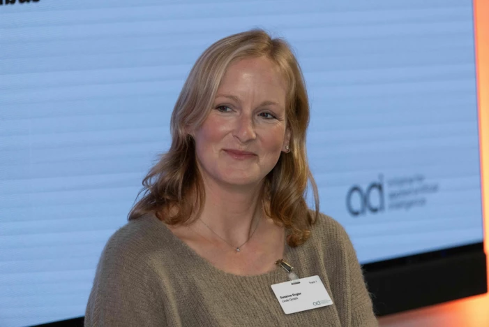 Female speaker at a conference